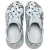 Crocs (Femme) Classic Crush Disco Clog « Bleu transparent » 208121-0ZT