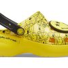 Crocs (WMNS) X Smiley Classic Clog Sandales à semelle épaisse avec visage souriant et nuages  Jaune Noir 207233-90H